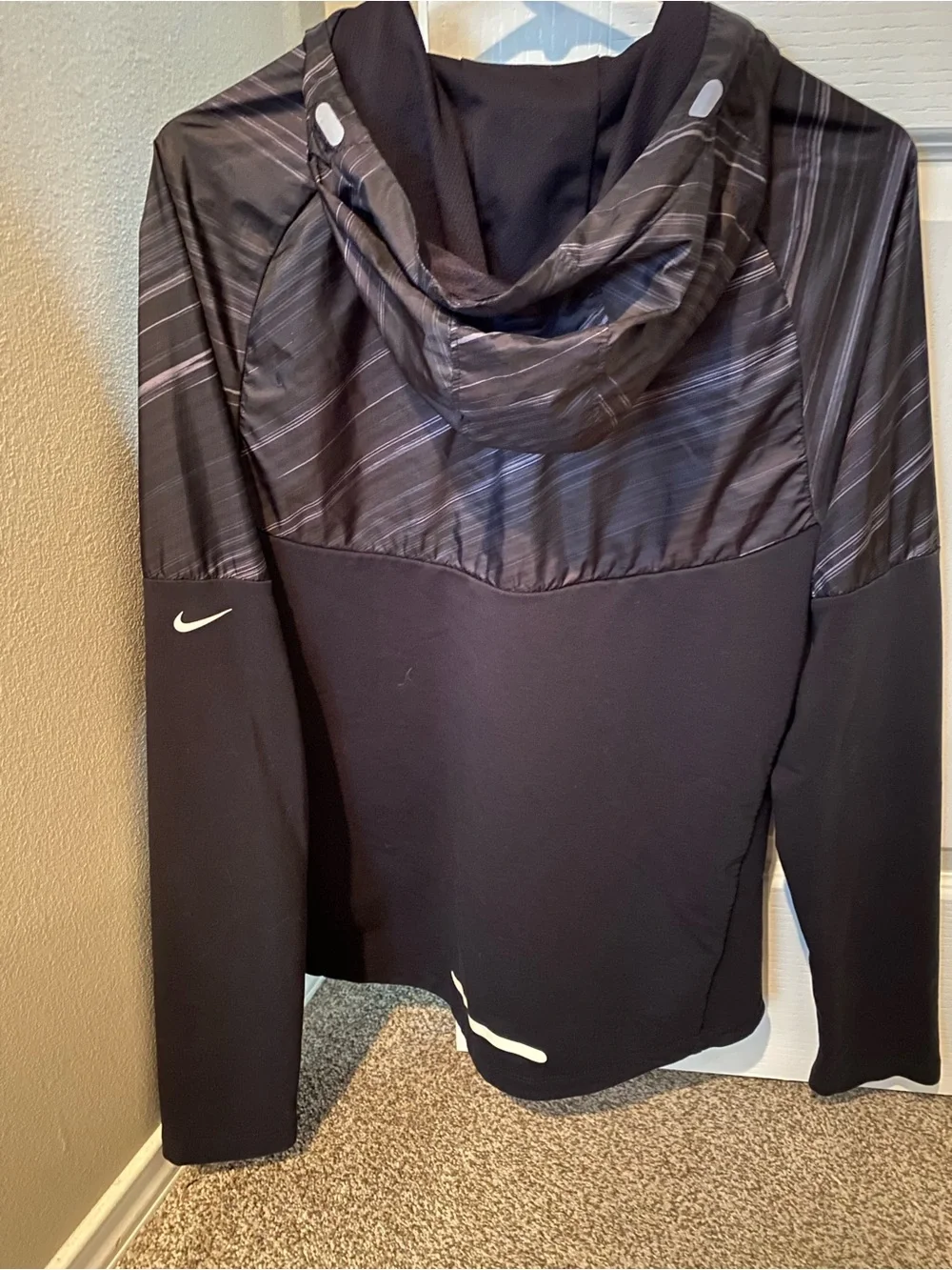 Nike Black Hooded Dri-FIT running jacket with Subtle Gray Stripe